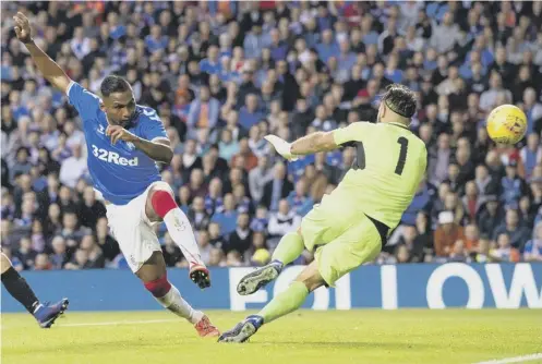  ??  ?? 0 Alfredo Morelos completes his hat-trick to make it 4-0 against St Joseph’s. He was replaced by Jermain Defoe, who added two more.