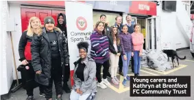  ??  ?? Young carers and Kathryn at Brentford FC Community Trust