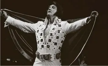  ?? George Kalinsky via AP ?? Elvis Presley performs at Madison Square Garden in June 1972, five years before he died in Memphis.