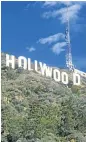  ??  ?? GOING, GONE: The original Hollywood sign on a Los Angeles hillside was sold