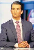  ?? ASSOCIATED PRESS FILE PHOTO ?? Donald Trump Jr. is interviewe­d by host Sean Hannity on the Fox News Channel on July 11.