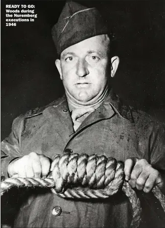  ??  ?? READY TO GO: Woods during the Nuremberg executions in 1946