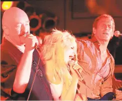  ?? Stuart Walls / File photo ?? Woodstock Studio Dave Mason, Sera Buras and Michael Bolton perform at The Michael Bolton Charites 17th annual Benefit Concert at the Stamford Marriott Hotel in 2009.