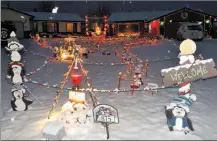  ?? Photo contribute­d ?? You can see Ken Berry’s penguin Christmas display at 875 Theodora Rd. in Rutland.