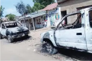  ??  ?? Some of the burnt vehicles in Gurbin Bore