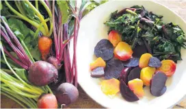  ?? [PHOTO PROVIDED BY BARBARA DAMROSCH] ?? These are red and golden beets from the author’s garden. Both the roots and the leaves can be cooked.