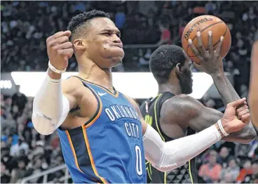  ?? [AP PHOTO] ?? Oklahoma City Thunder guard Russell Westbrook reacts after being fouled during Tuesday’s game against the Hawks in Atlanta. Oklahoma City won 119-107.