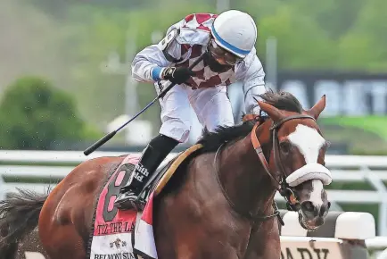  ?? SETH WENIG/AP ?? Tiz the Law, with jockey Manny Franco aboard, crosses the finish line to win the 152nd running of the Belmont Stakes on June 20. Tiz the Law is the expected favorite for the Kentucky Derby.