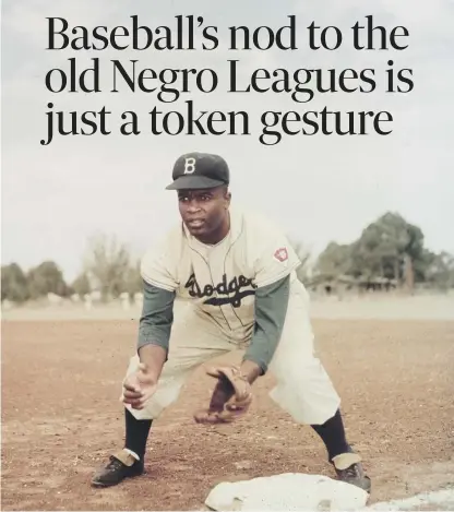  ??  ?? 0 Jackie Robinson of the Brooklyn Dodgers became the first African American to play in Major League Baseball.