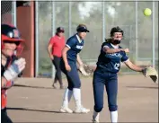  ?? ?? Marin Catholic pitcher Rose Malen (12) throws to first base to get Redwood's Kaela Sparler (2) during a NCS D-II quarterfin­al in Larkspur on Friday.