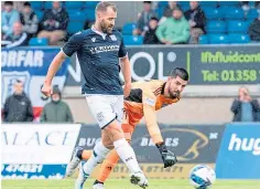  ?? ?? BLUES CRUISE: Zak Rudden, top right, chips the goalkeeper to put Dundee 1-0 up in Peterhead. Niall Mcginn, above right, scores his side’s second goal in the 4-0 rout, and Shaun Byrne, above left, challenges for the ball with a Blue Toon trialist during the pre-season friendly.