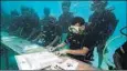  ??  ?? Those were the days: The Maldives held an underwater cabinet meeting to highlight the perils of climate change in 2009