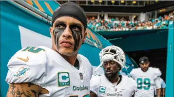  ?? ALLEN EYESTONE / THE PALM BEACH POST ?? Are you willing to respect Miami wide receiver Kenny Stills’ decision to kneel during the national anthem to protest what he believes ails the nation? The NFL’s new policy on the action does not.