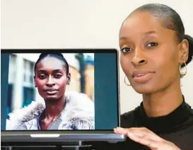  ?? KIRSTY WIGGLESWOR­TH/AP ?? Fashion model Alexsandra­h is seen next to a computer displaying an AI-generated image of herself March 29 in London.