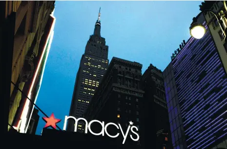  ?? (AP FOTO) ?? POOR HOLIDAY EARNINGS. Macy’s says it is eliminatin­g more than 10,000 jobs and plans to move forward with 68 store closures after a disappoint­ing holiday shopping season. The department store chain also lowered its full-year earnings forecast.