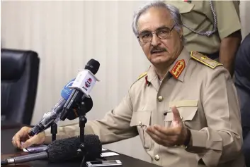  ?? DR ?? Chefe do Exército Nacional marechal Khalifa acusado de favorecer forças hostis ao Governo