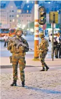  ?? FRANCOIS LENOIR/REUTERS ?? Militares en la Estación Central.