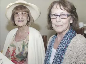  ??  ?? Bernice Kent, left, and Rose McKinley were among the first crowd to partake in high tea at the Hotel Selkirk, an event running Wednesdays all summer.