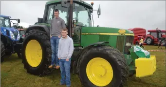  ??  ?? Robert Ryan from Fermoy and Aidan Walsh from Glanworth with a John Deere 690 prior to setting out on last Sunday’s Memorial Run.