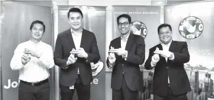  ??  ?? Jollibee Foods Corporatio­n Business Channels Director Mario Malalis, Jollibee Foods Corporatio­n Vice President for National Business Channels Manjie Yap, Globe Business Senior Vice President Peter Maquera, and Globe Business Cluster Sales Head Robie...