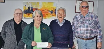  ?? ?? Finley CanAssist treasurer Mark Keran and president Pat Radford receive a cheque from Finley MenShed members Bill Rowlands and Gavin Butcher.