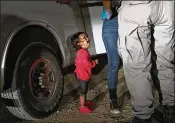  ?? JOHN MOORE / GETTY IMAGES ?? A 2-year-old Honduran cries as her mother, Sandra Sanchez, is searched and detained near the U.S.-Mexico border June 12 in McAllen, Texas. The photo became a rallying cry for foes of U.S. immigratio­n policies.
