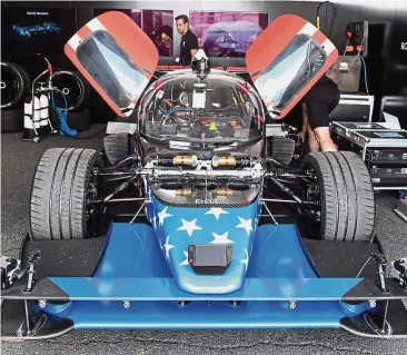  ??  ?? New experience: A file picture showing the Robocar, the world’s first driverless electric racing car, being prepared on the sidelines before a demonstrat­ion at the inaugural New York ePrix Formula E World Championsh­ip in the Brooklyn borough of New...