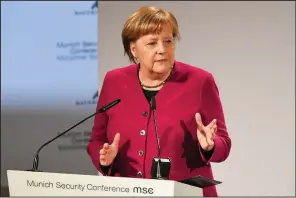  ?? AP/KERSTIN JOENSSON ?? German Chancellor Angela Merkel, speaking Saturday in Munich, said the split between the U.S. and European allies over the nuclear deal “depresses me very much,” but she defended the pact as a channel for pressuring Iran on other key issues.