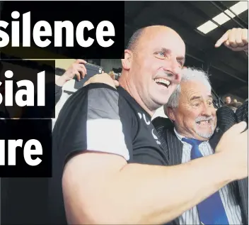  ??  ?? TRIUMPHANT Paul Cook celebratin­g Pompey’s promotion at Notts County in 2017 with chairman Iain McInnes, above