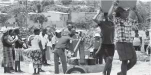  ??  ?? File photo: Residents fetch water from a borehole