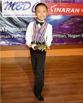  ??  ?? Wei Sam’s dancing prowess won him 12 medals at a dancesport championsh­ip.