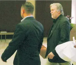  ?? MIKE STOCKER/STAFF PHOTOGRAPH­ER ?? Steve Bannon leaves the Fort Lauderdale offices of the Tripp Scott law firm after speaking to a group there. He is in South Florida for a two-day conference at The Breakers in Palm Beach.