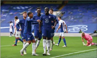  ?? PIC: GETTY IMAGES ?? Defensive rock: Kurt Zouma of Chelsea celebrates with teammates after scoring