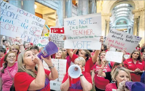  ?? AP PHOTO ?? Teachers from across Kentucky gather inside the state Capitol to rally for increased funding for education, Friday, April 13, 2018, in Frankfort, Ky.