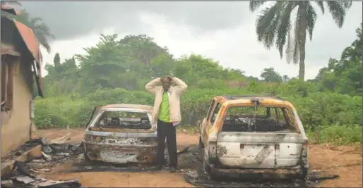  ??  ?? A man in shock over the level of destructio­n after the recent Ilofa Odo-Owa communal clashes in Oke-Ero Local Government Area of Kwara State