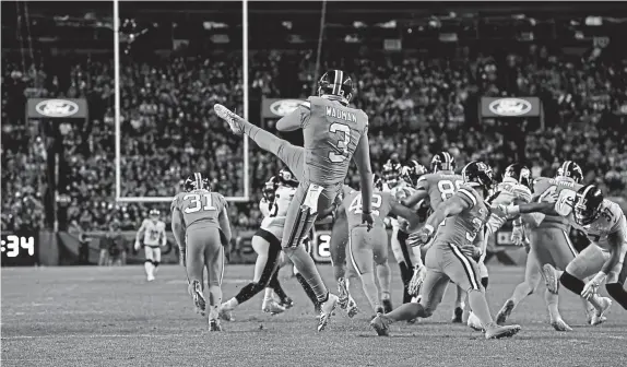  ?? Eric Lutzens, The Denver Post ?? Denver’s Colby Wadman punts the ball during the fourth quarter vs. the Steelers on November 25 at Broncos Stadium at Mile High.