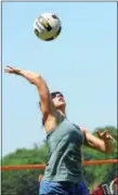  ??  ?? In women’s open play Kristen Deonarine servers during the Pottstown Volleyball Rumble.