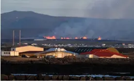  ?? Photograph: Halldor Kolbeins/AFP/Getty Images ?? An industrial complex against the backdrop of lava flows near Grindavík after the volcanic eruption.