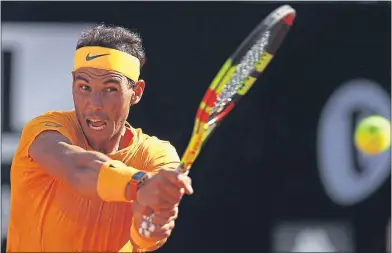  ??  ?? Rafael Nadal blasted his way past Novak Djokovic yesterday