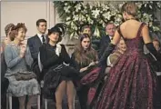  ?? Liam Daniel Focus Features ?? ADA (Lesley Manville, left) enjoys the fashion show in the delightful new “Mrs. Harris Goes to Paris.”