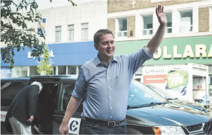  ?? CP PHOTO ?? Conservati­ve Leader Andrew Scheer, seen arriving Tuesday at a child-care facility in Toronto, spoke out against same-sex marriage as MPs were debating whether to legalize it nearly 15 years ago, and the Liberals are reminding everyone about it while pressuring him to attend the Ottawa Pride parade.