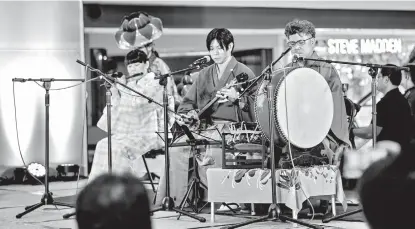  ?? ?? Guests and participan­ts were treated to a colorful and mesmerizin­g performanc­e of Ryukyu Buyo Okinawan Traditiona­l Dance