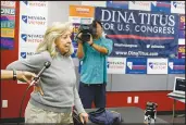  ?? BRIDGET BENNETT/THE NEW YORK TIMES ?? U.S. Rep. Dina Titus, D-nev., visits a campaign field office June 14, Nevada’s primary election day. Titus, whose district was redrawn after the 2020 census, is facing her first truly competitiv­e race in over a decade this fall.