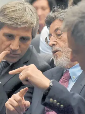  ?? DYN ?? Charla. Abad ayer con Caputo en el anuncio de la reforma impositiva.