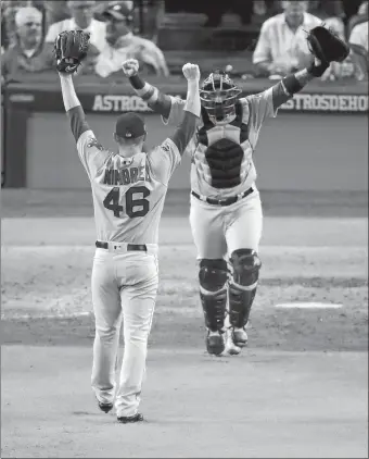  ?? LYNNE SLADKY/AP PHOTO ?? Red Sox relief pitcher Craig Kimbrel celebrates with catcher Christian Vazquez on Thursday night after winning the American League Championsh­ip Series against the Astros in Houston.