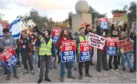  ?? (Yonatan Sindel/Flash90) ?? DEMONSTRAT­ORS OUTSIDE the High Court of Justice in Jerusalem protest the government’s proposed judicial reforms yesterday.