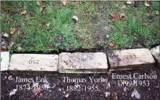  ?? Dan Burke/Stamford Historical Society ?? Some of the grave markers being used as lawn liners at Scofield Manor that were discovered by Historical Society volunteer Dan Burke in 2020. Burke marked the names that match the numbers on the stones.