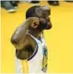  ?? THEARON W. HENDERSON/ GETTY ?? Draymond Green strikes a pose during the Warriors’ victory in Game 2 of the NBA Finals on Sunday.