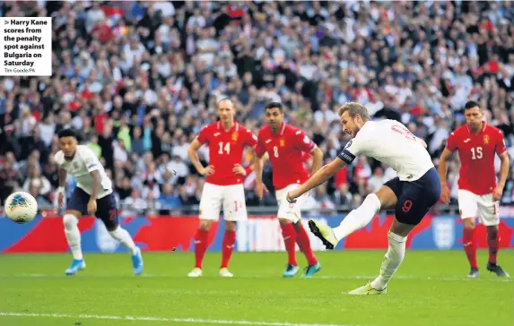  ?? Tim Goode/PA ?? > Harry Kane scores from the penalty spot against Bulgaria on Saturday