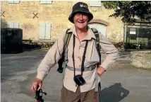  ??  ?? Len Bayliss takes a breather during a walk in the Dordogne Valley, France. He was an avid walker and, with his wife Vivienne, a keen traveller.